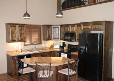 Cabin at Lake Campbell kitchen area by Shawn's Custom Homes